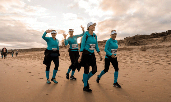 Coastrek-Adelaide-Fleurieu-Peninsula-2024-team-walk-on-beach