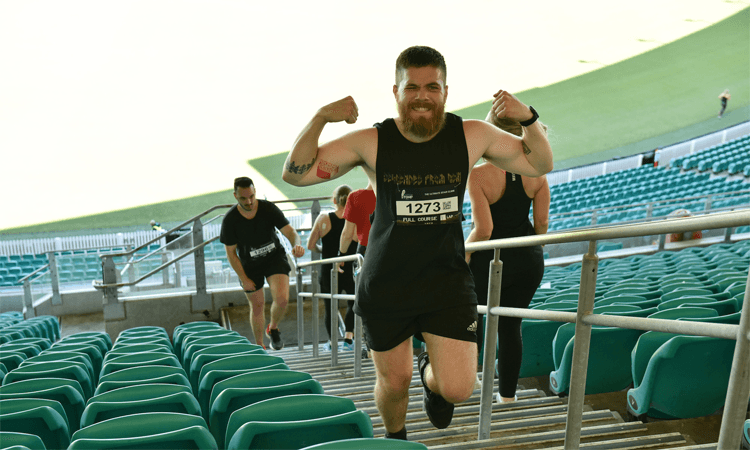 Stadium Stomp SCG 2023 flexing muscles